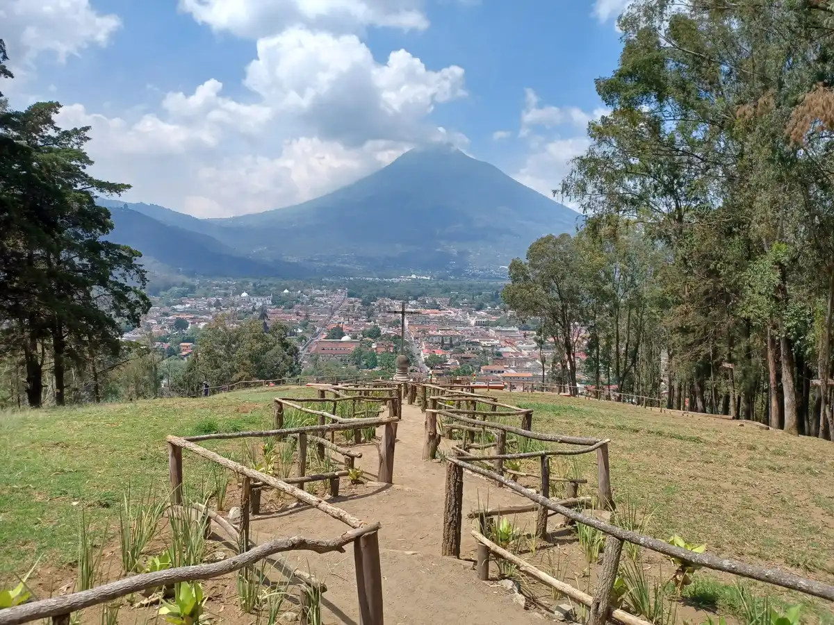 Mountain and Volcán de Agua views from the Cerro de la Cruz viewpoint on a private Hobbitenango coffee farm tour from Antigua, Guatemala