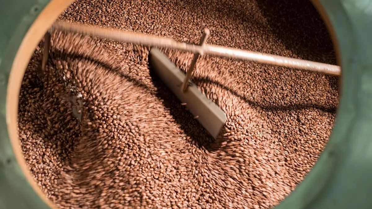 Coffee being roasted at Finca La Azotea on a private Hobbitenango coffee farm tour from Antigua Guatemala